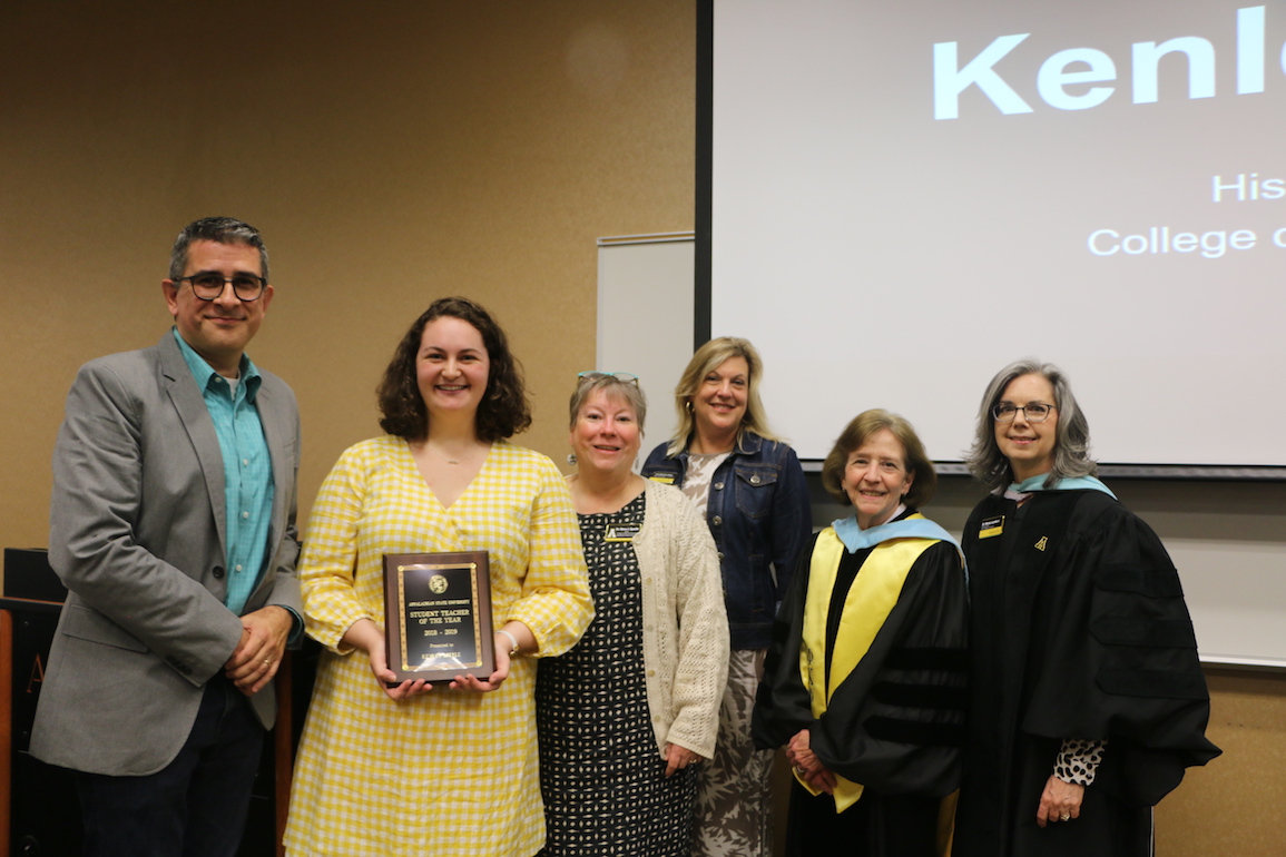 Kenley Little receiving her award at the College of Education