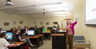 Students learning about library resources