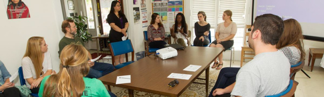 Students in a circle in a classroom