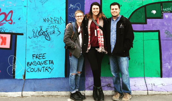 History alums Zach Brinkman ('16), Meghan Andreoli ('16), and Troy Colvard ('16) take a break from student teaching in Germany to visit the Berlin Wall.