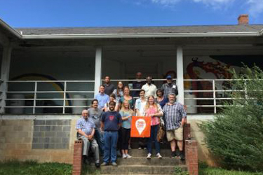 Graduate students and local leaders photographed at Lincoln Heights, a Rosenwald School in North Wilkesboro, NC.